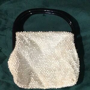 Reversible beaded handbag